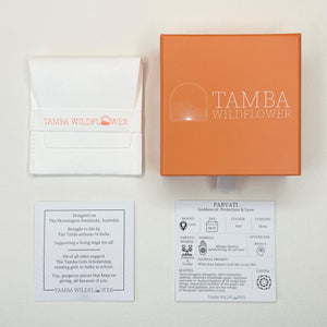 Parvati delicate stamped gold pendant necklace packaging.